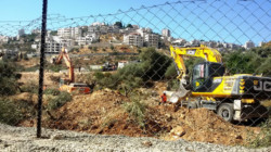 Il muro di separazione israeliano scalza gli ulivi a Cremisan